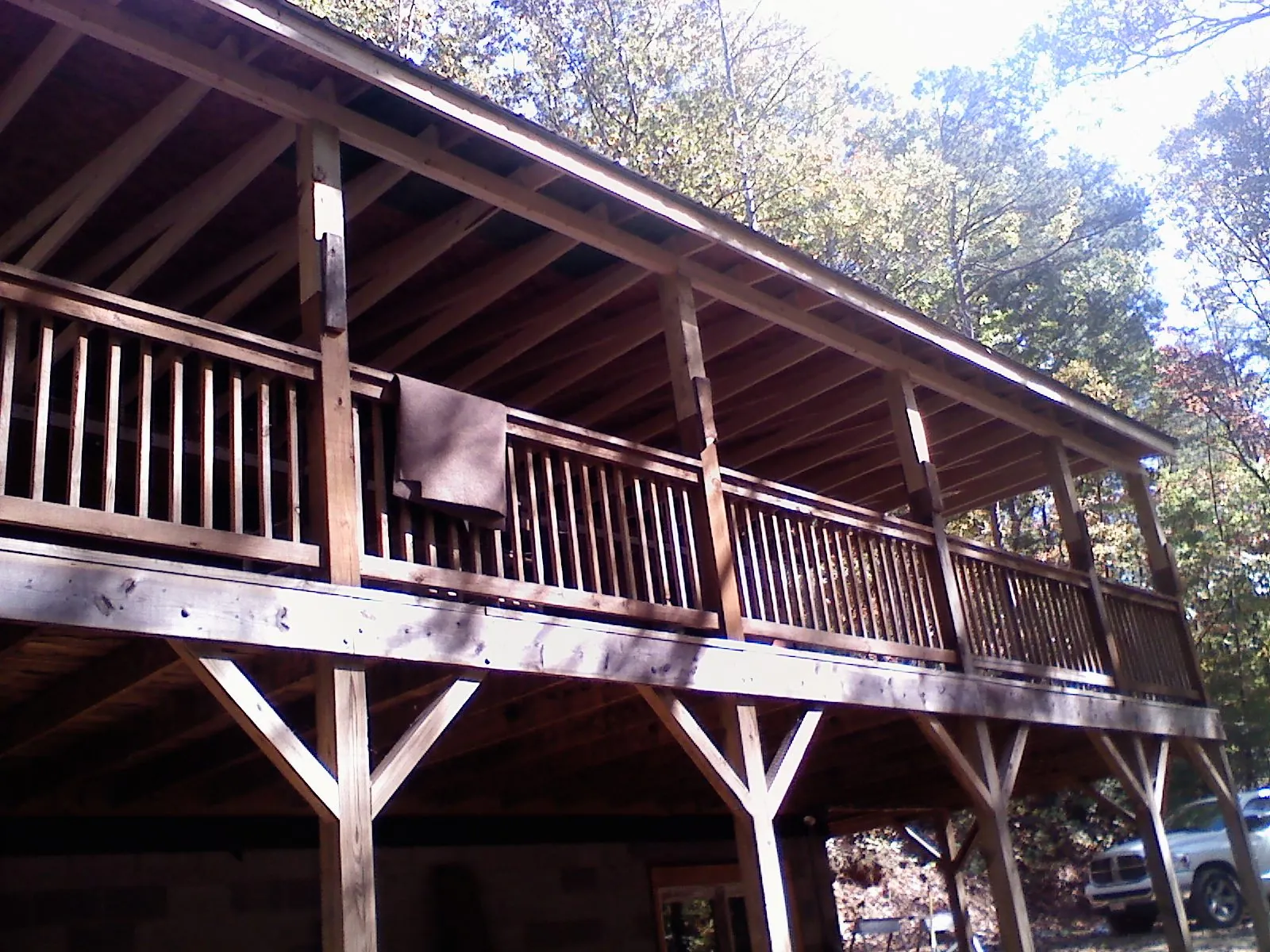 Timber framing under a new elevated porch and deck — Roof Leak Repair in Gratis by Roofing Brothers